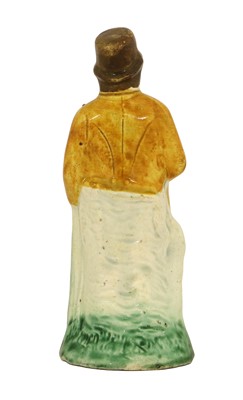 Lot 58 - A Prattware Figure of a Gentleman, circa 1800,...