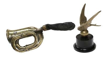 Lot 552 - A Brass Car Mascot for Swift Light Cars,...