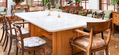 Lot 631 - A Pine and Marble-Top Dining Table, modern, of...