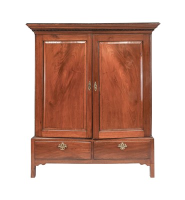 Lot 667 - A George III Mahogany Cupboard, the dentil...