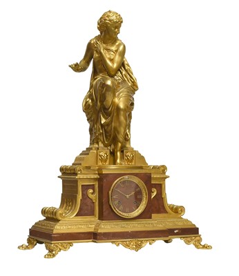 Lot 686 - A Bronze Ormolu and Red Marble Quarter...