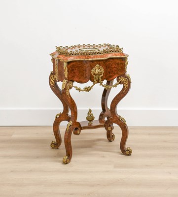 Lot 882 - A French Amboyna and Gilt-Metal-Mounted...