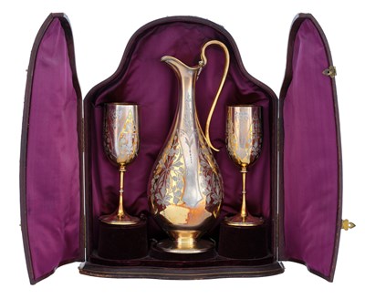 Lot 558 - A Cased Victorian Parcel-Gilt Silver Claret-Jug and a Pair of Goblets En Suite