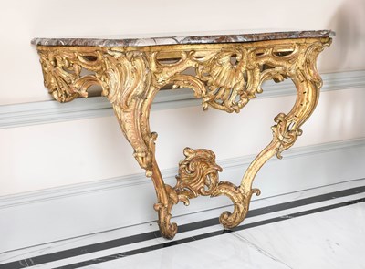Lot 601 - A Louis XV Carved Giltwood Console Table, the...