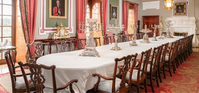Lot 947 - A George III-Style Four-Pillar Dining Table,...