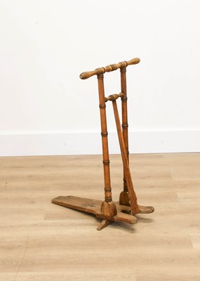 Lot 1064 - A Victorian Stained Beech or Walnut Boot Pull,...
