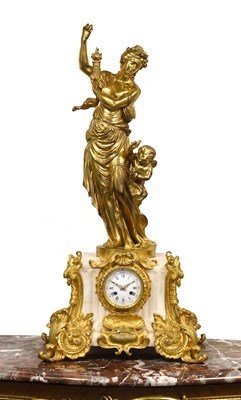Lot 596 - A French Bronze Ormolu and White Marble...