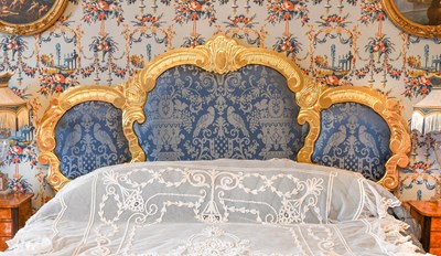 Lot 389 - A Louis XV-Style Carved Giltwood Upholstered...