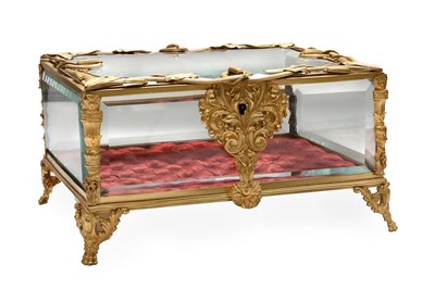 Lot 1110 - A French Gilt-Metal-Mounted Glass Table Casket,...