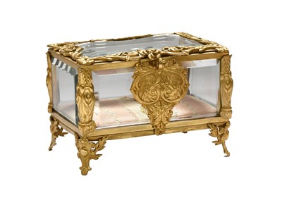 Lot 1102 - A French Gilt-Metal-Mounted Glass Table Casket,...