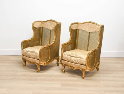 Lot 424 - A Pair of Louis XVI-Style Bergere Wing...