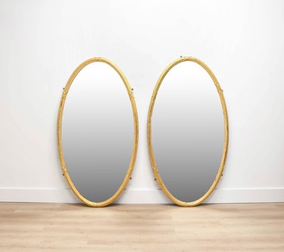Lot 291 - A Pair of Oval Wall Mirrors, early 20th...