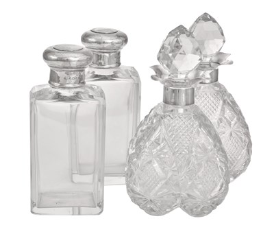 Lot 256 - Two Pairs of Edward VII or George V Silver-Mounted Cut-Glass or Plain Glass Scent-Bottles