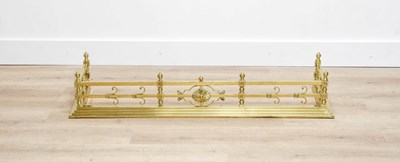 Lot 171 - A Victorian Brass Fire Fender, late 19th...