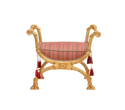 Lot 165 - A Regency-Style Carved Giltwood X-Form Stool,...