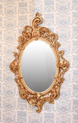 Lot 198 - A French Rococo-Style Carved Giltwood Oval...
