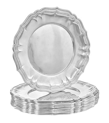 Lot 1034 - A Set of Twelve German Silver Dinner-Plates