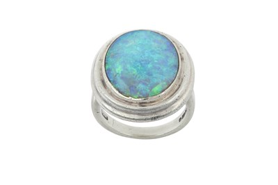 Lot 2046 - A 9 Carat Gold Opal Ring the oval cabochon...