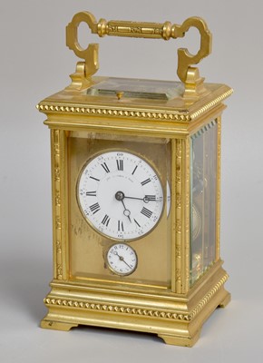 Lot 7 - A French Brass Strike and Repeat Alarm...