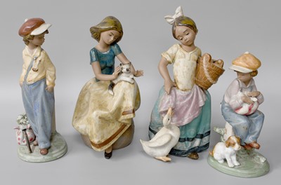 Lot 30 - Four Lladro Figures Including: Boy and Mile...