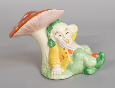 Lot 297 - Clarice Cliff Gnome, resting next to a...