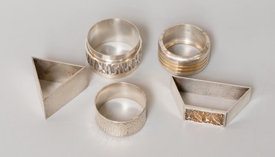 Lot 108 - Five Various Elizabeth II Silver Napkin-Rings,...