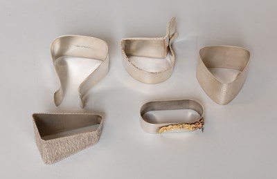 Lot 111 - Five Elizabeth II Silver Napkin-Rings,...