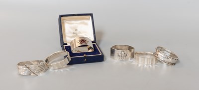 Lot 124 - Six George V and Later Silver Napkin-Rings,...