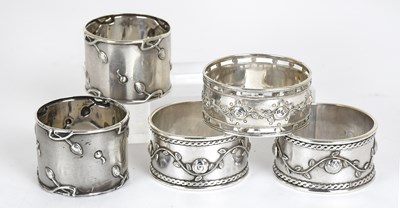 Lot 117 - Five Assorted Silver Napkin-Rings, including a...