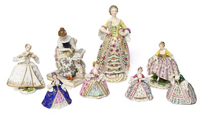 Lot 184 - A Set of Four Porcelain Figures of Ladies in...
