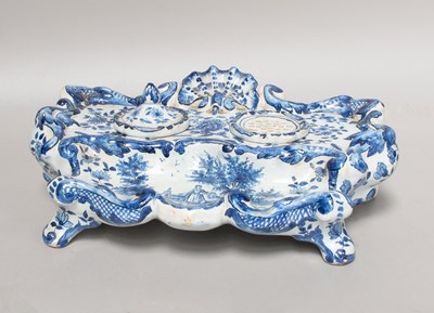 Lot 117 - A Dutch Delft Desk Stand, 19th century, scroll...