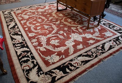 Lot 1284 - Indian Carpet, the terracotta field of large...