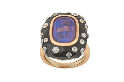 Lot 2050 - An Opal, Onyx and Diamond Ring the cushion cut...