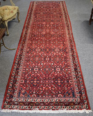 Lot 1262 - Hamadan Long Rug, the blood red Herati field...