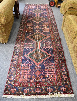 Lot 1263 - Heriz Runner, the deep indigo field with a...
