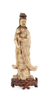 Lot 82 - A Chinese Soapstone Figure of Guanyin, Qing...