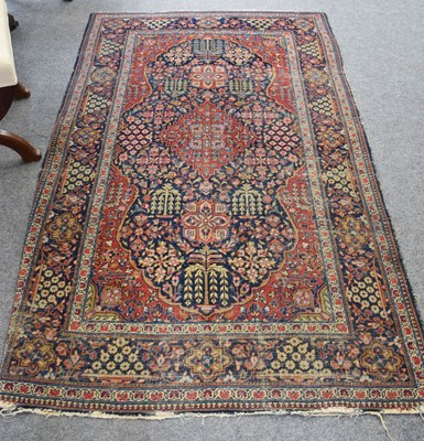 Lot 1109 - Tabriz Rug, the shaped indigo field with...