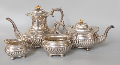 Lot 51 - A Four-Piece Edward VII Silver Tea and...