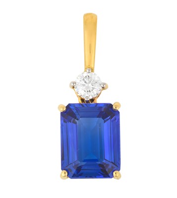 Lot 2077 - An 18 Carat Gold Tanzanite and Diamond Pendant...