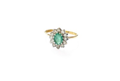 Lot 268 - An 18 Carat Gold Emerald and Diamond Cluster...
