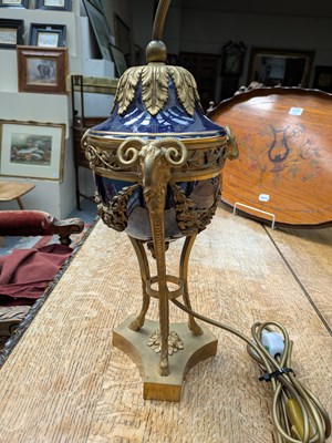 Lot 1328 - A Gilt-Metal Mounted Porcelain Table Lamp, in...