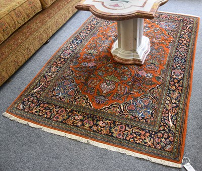 Lot 1265 - Part-Silk Indian Rug, the terracotta field...