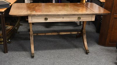 Lot 1383 - A Regency Mahogany Sofa Table, on reeded...