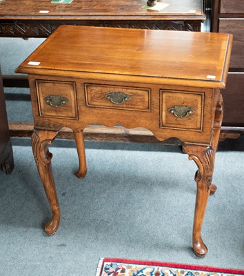 Lot 1360 - A 20th Century Crossbanded Oak Lowboy, 68cm by...