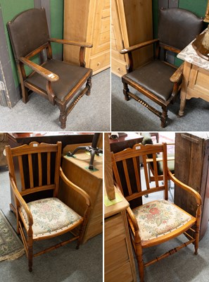 Lot 1345 - A Pair Of 1920s Oak and Leather Open Armchairs,...