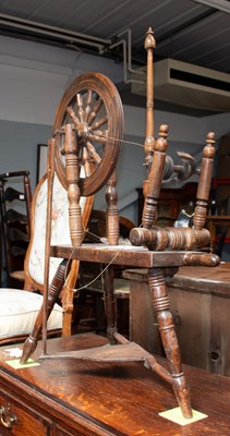 Lot 1154 - An 18th Century Style Oak Spinning Wheel