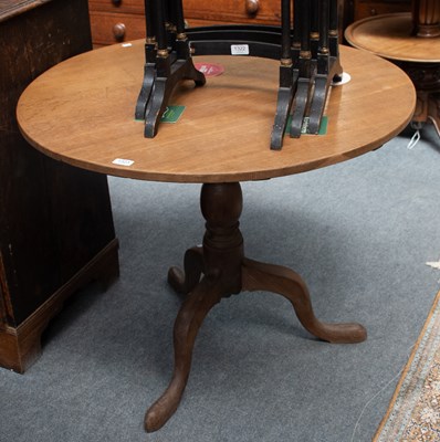 Lot 1290 - A 19th Century Tilt Topped Oak Tripod Table,...