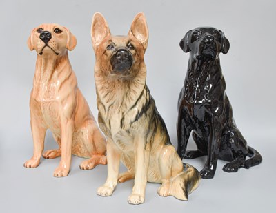Lot 25 - Beswick Fireside Dogs, comprising Labrador in...