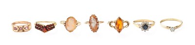 Lot 260 - Seven Dress Rings, including a diamond...