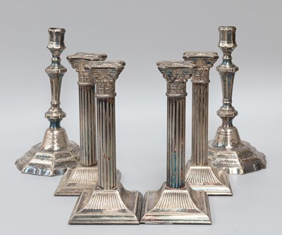 Lot 167 - A Set of Four Silver Plate Candlesticks, each...